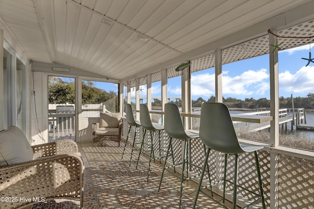 sunroom with plenty of natural light