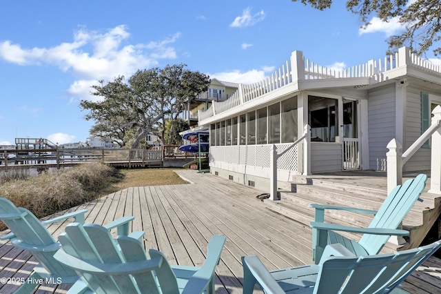 deck featuring a sunroom