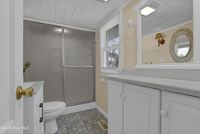 bathroom featuring tile patterned floors, wood ceiling, vanity, toilet, and a shower with shower door