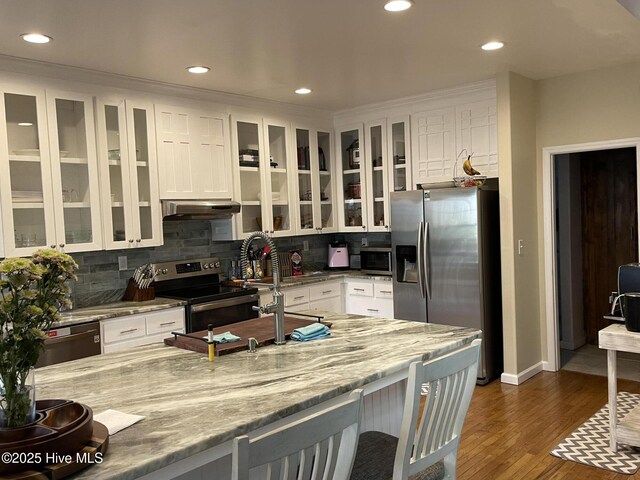 dining room featuring hardwood / wood-style flooring