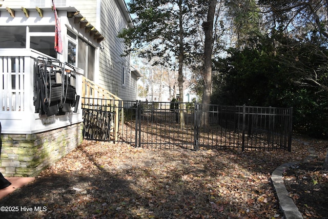 view of yard with a sunroom