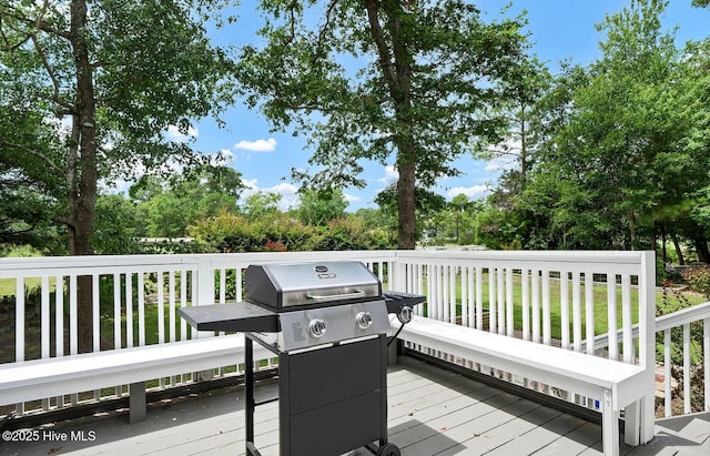 wooden deck with grilling area