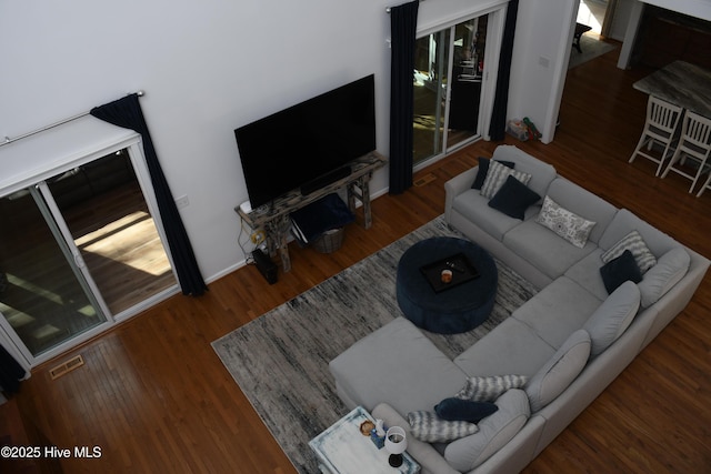 living room featuring dark hardwood / wood-style flooring