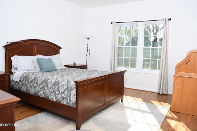 bedroom featuring light hardwood / wood-style flooring