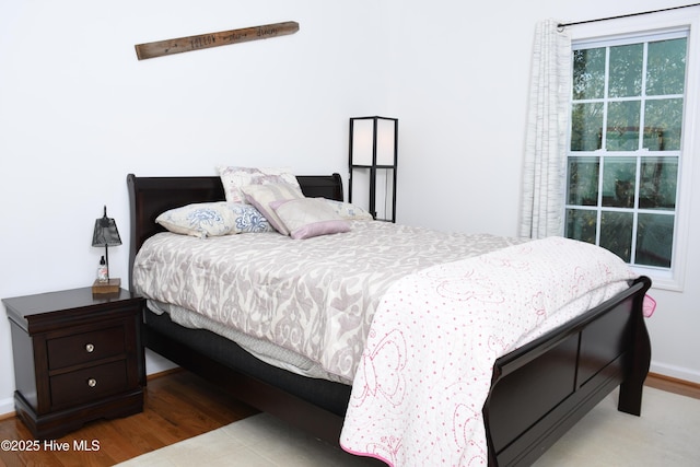 bedroom featuring light hardwood / wood-style flooring