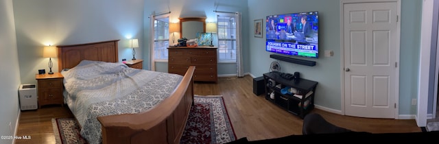 bedroom featuring hardwood / wood-style flooring