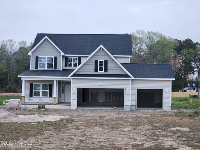 craftsman house featuring a garage