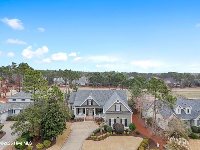 view of front facade featuring a residential view and covered porch