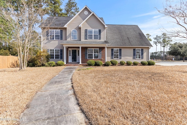 view of front facade featuring a front yard