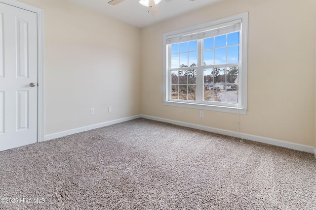 unfurnished room with carpet floors and ceiling fan