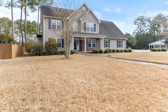 view of front facade featuring a porch and a front lawn