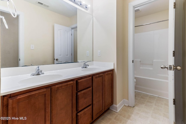 full bathroom featuring vanity, shower / bathing tub combination, and toilet