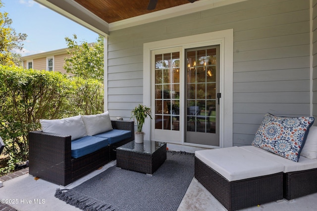 view of patio featuring outdoor lounge area and ceiling fan