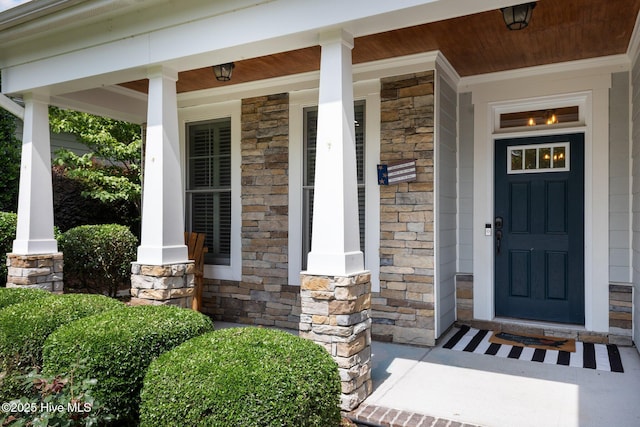 property entrance with covered porch