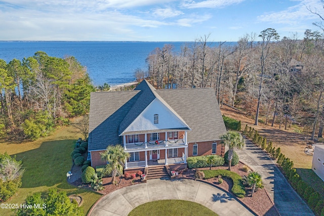 drone / aerial view featuring a water view