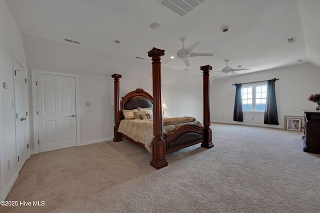 carpeted bedroom featuring vaulted ceiling and ceiling fan