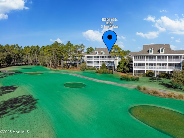 3350 Club Villas Dr Unit 205, Southport, NC 28461 - view of community with view of golf course and an area to practice putting