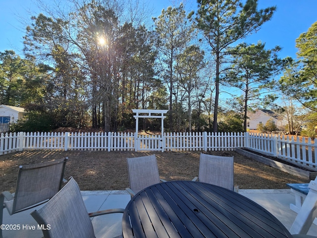 wooden deck featuring a patio area