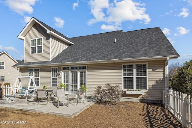 back of property featuring a patio area