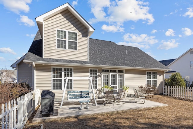 rear view of property with a patio area