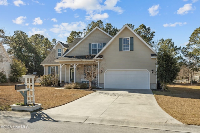 view of front of home with a garage and a porch