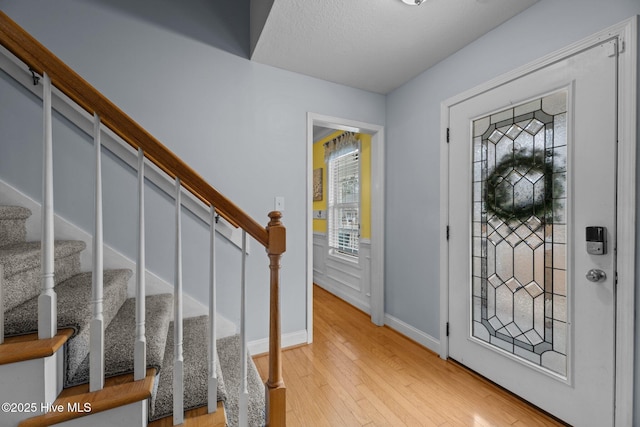 foyer entrance featuring light hardwood / wood-style floors