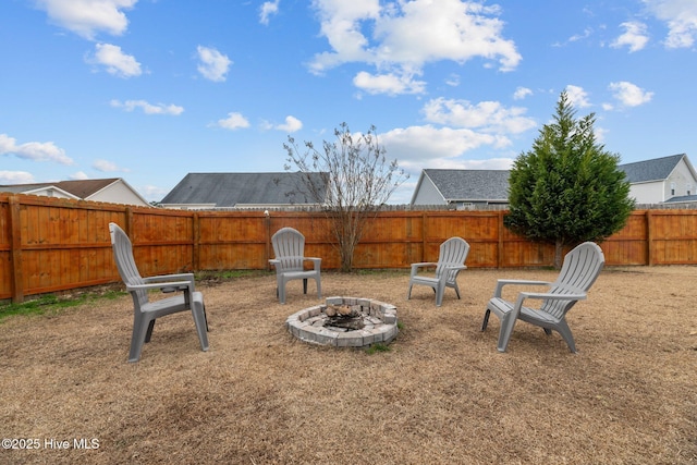 view of yard featuring a fire pit