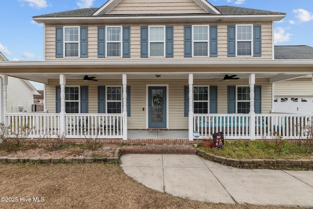 view of front facade with a porch, a garage, and ceiling fan