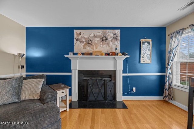 living room with wood-type flooring