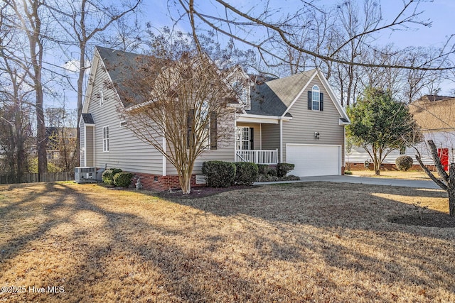 view of property with a front yard, a porch, a garage, and central AC unit