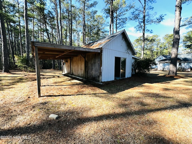 exterior space featuring a carport