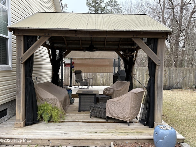 wooden terrace with a gazebo