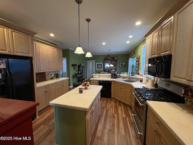 kitchen featuring pendant lighting, dark hardwood / wood-style floors, a center island, black appliances, and sink