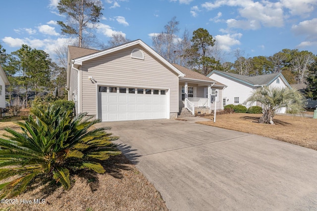 ranch-style home with a garage and covered porch