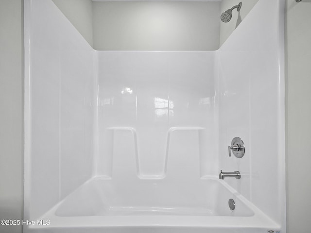 bathroom with shower / tub combination