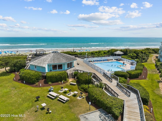 bird's eye view with a view of the beach and a water view