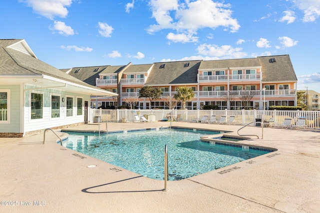 view of pool featuring a patio