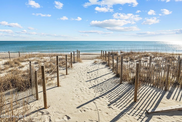 view of water feature with a beach view