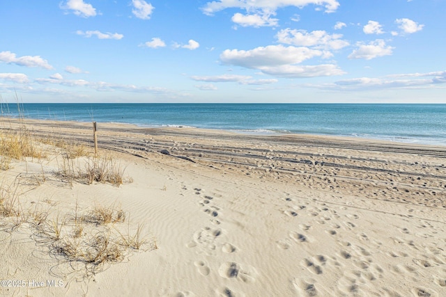 view of water feature featuring a beach view