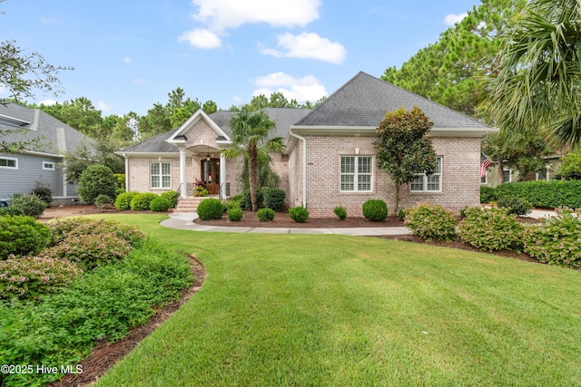 craftsman-style home with a front lawn