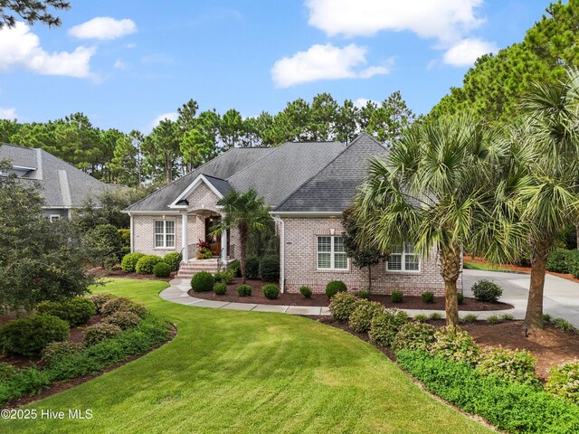 view of front of property with a front lawn