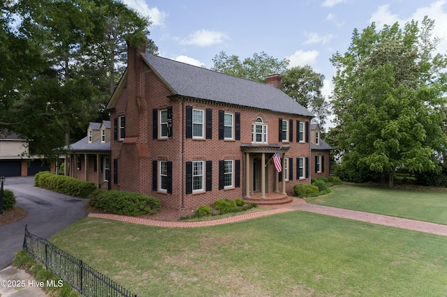 colonial house with a front lawn