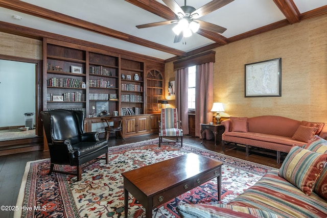 interior space with ceiling fan, hardwood / wood-style floors, and beam ceiling