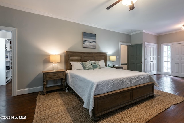 bedroom with ornamental molding, dark hardwood / wood-style floors, and ceiling fan