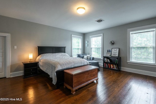 bedroom featuring dark hardwood / wood-style floors