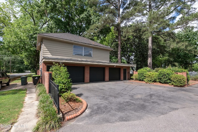 view of property exterior featuring a garage