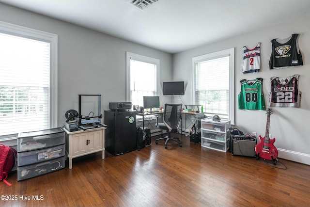 office area featuring dark wood-type flooring