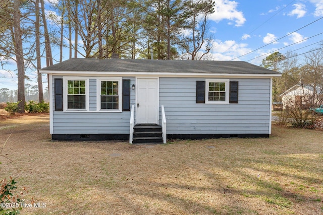 view of front of home with a front yard