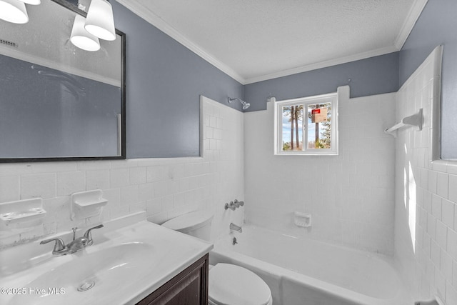 full bathroom featuring tiled shower / bath combo, vanity, ornamental molding, a textured ceiling, and toilet