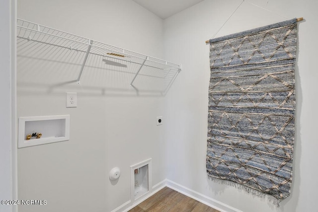 washroom with laundry area, hookup for a gas dryer, wood finished floors, hookup for a washing machine, and electric dryer hookup